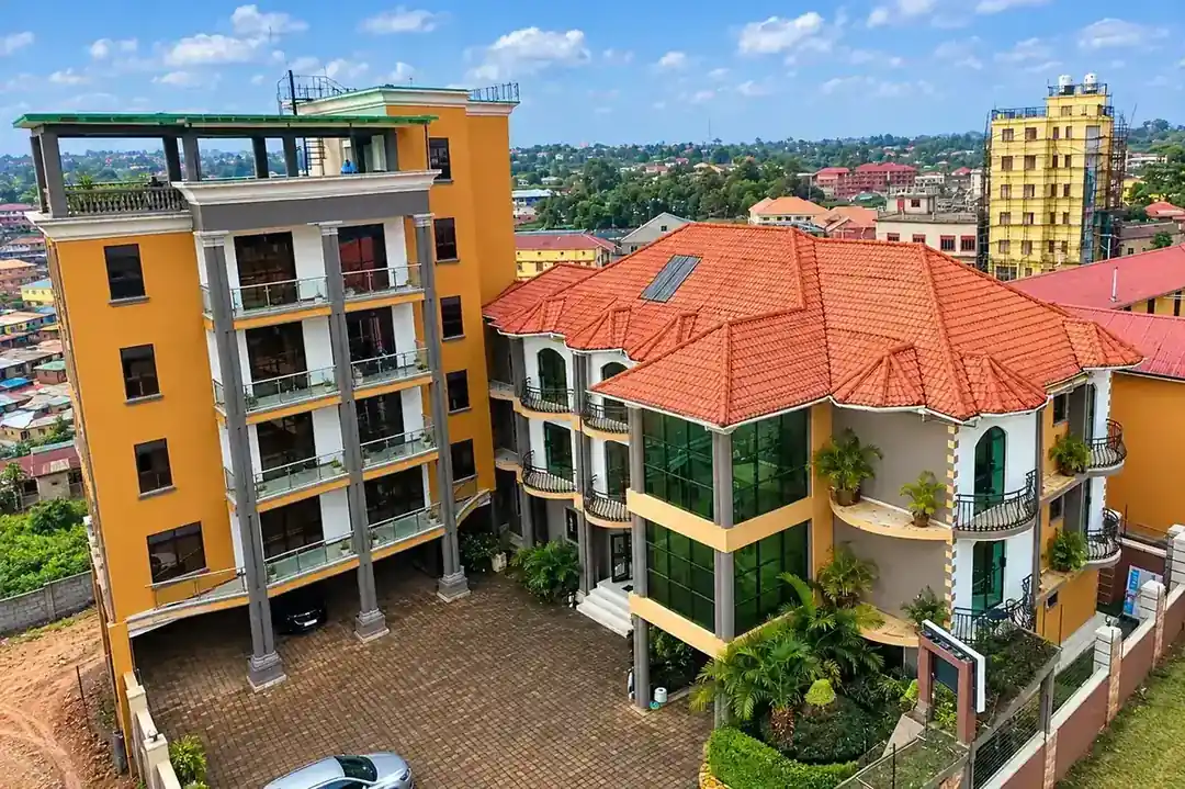 Aerial view of Relie Motel entrance with palm trees