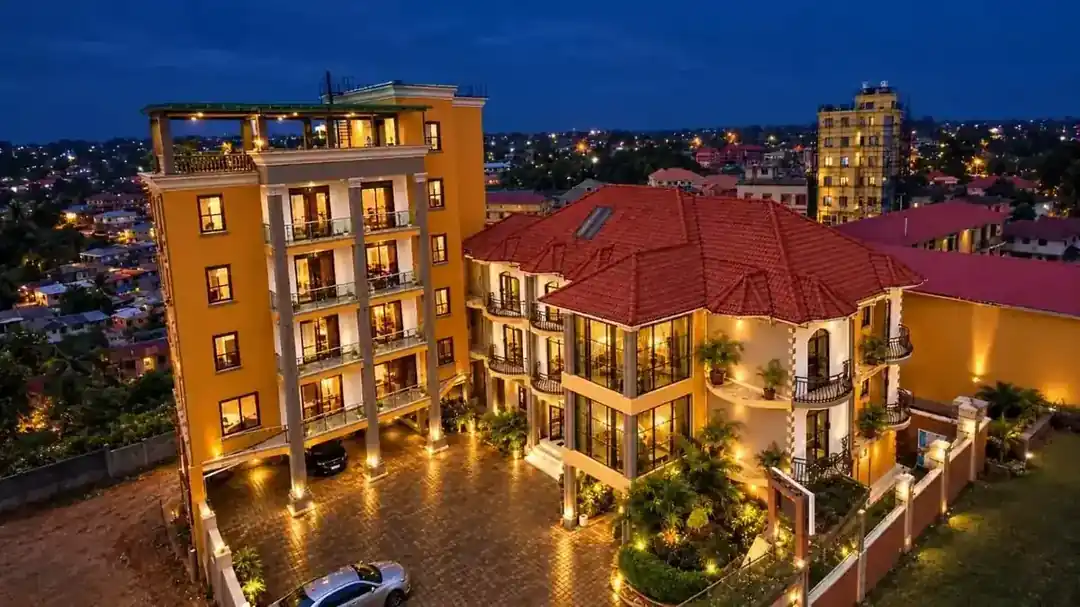 Relie Motel lit up at night, aerial view